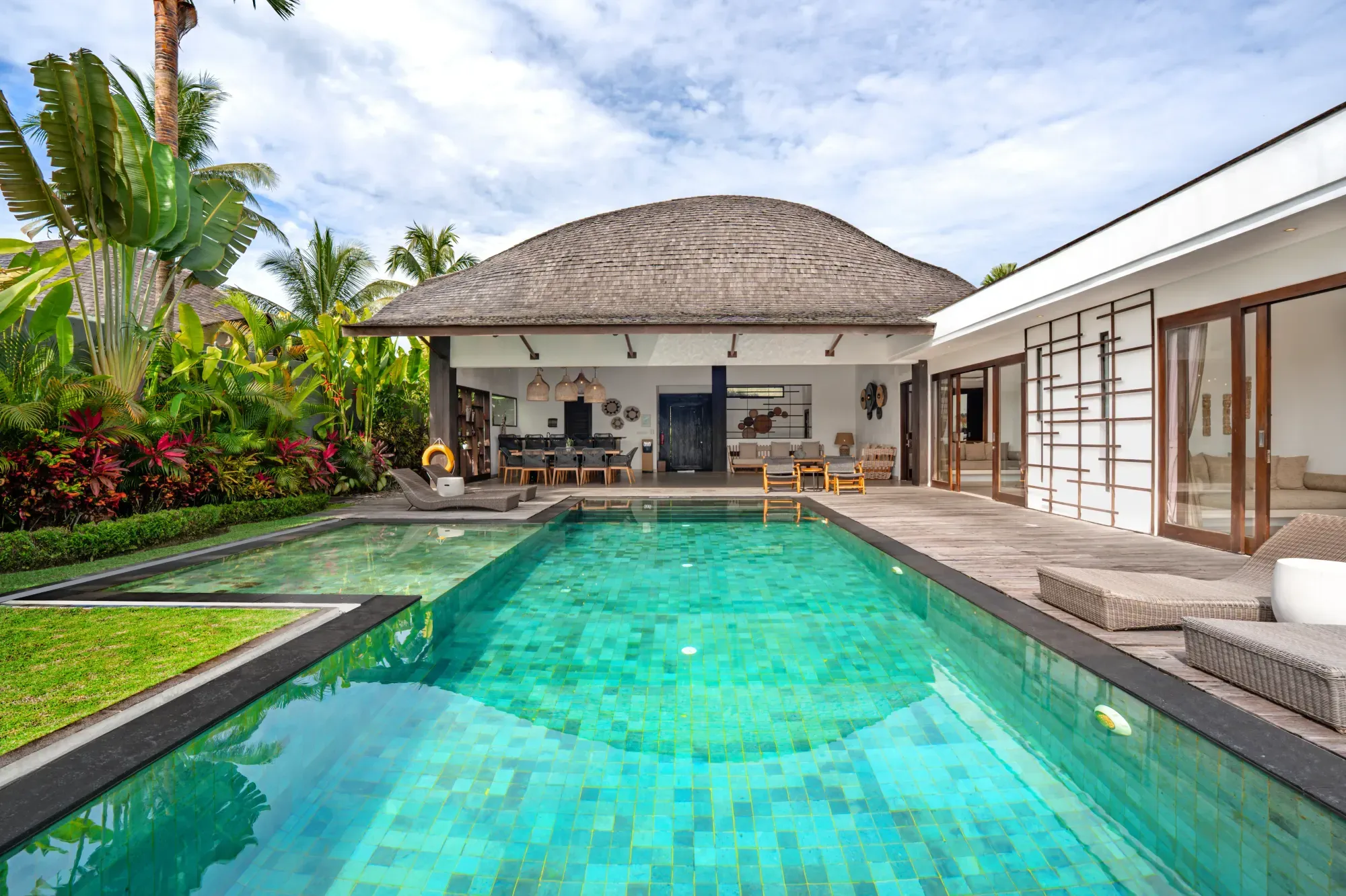 Private pool at a three-bedroom luxury villa surrounded by tropical greenery at K Club Ubud Bali